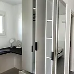 Minimal Grey Pool-front In Apartmán